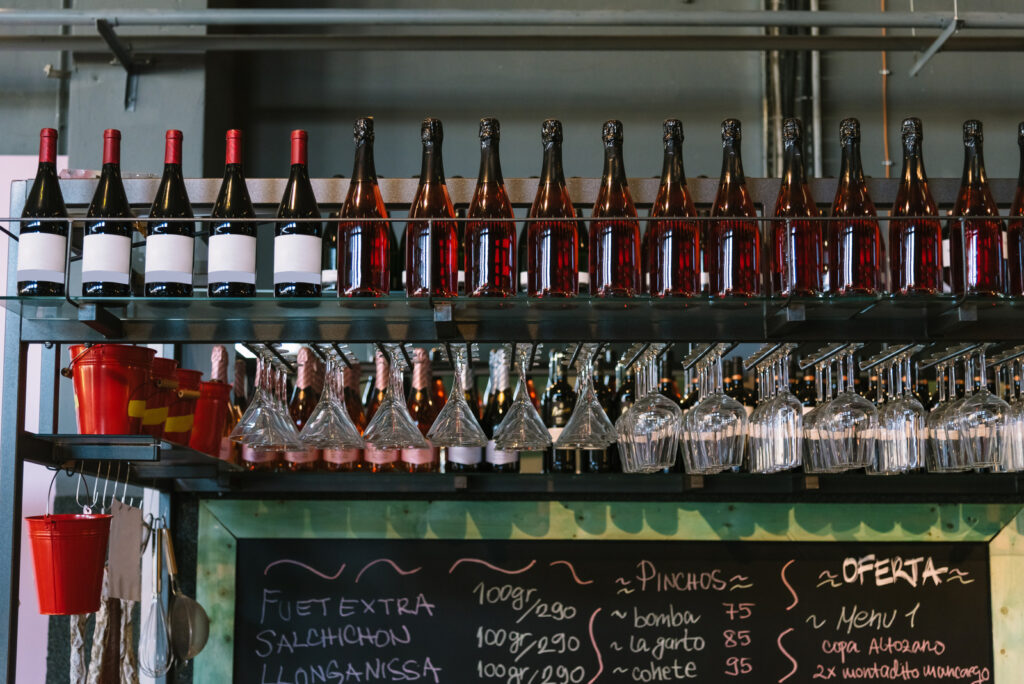 Wine bar interior with glasses and bottles