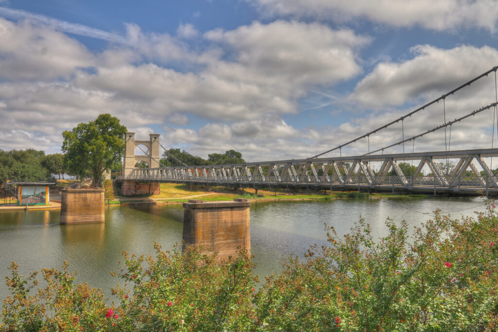 The old bridge over the Brazos River in Waco Texas, Built in 1870.